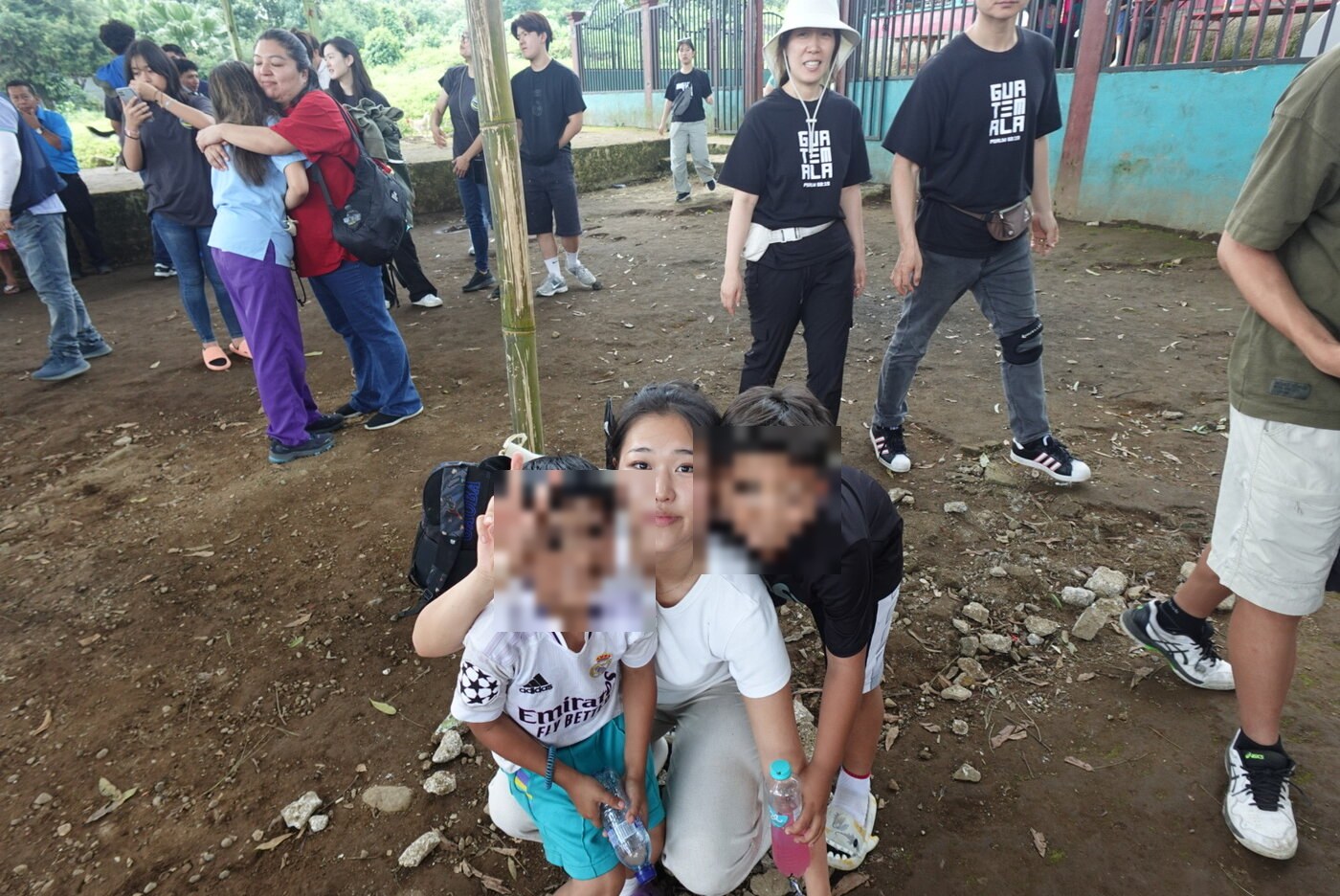 Grace with two children during the Guatemala service trip